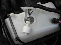Overflow container showing float switch